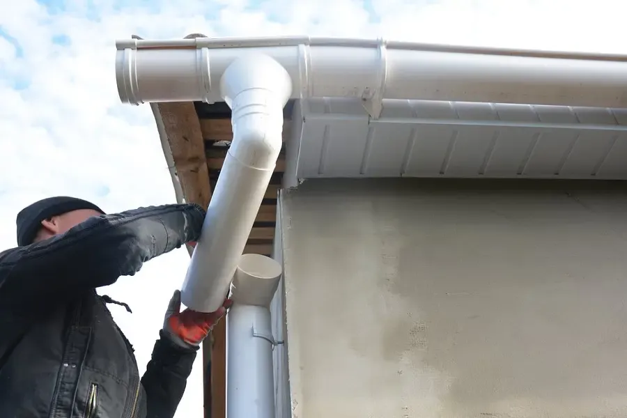 Residential gutter work at a roof edge